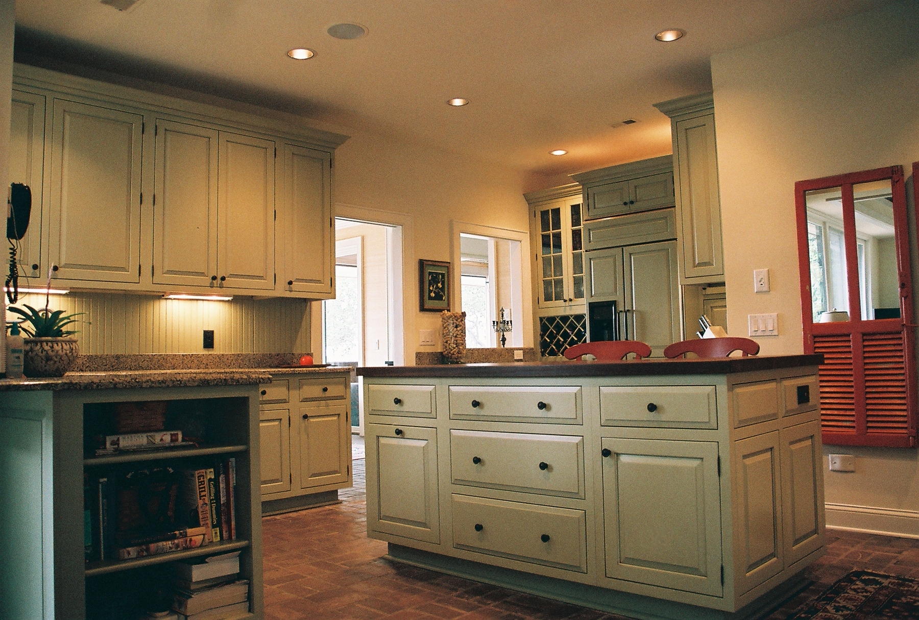 Elegant kitchen cabinets and granite countertops installation by RiverBend Cabinetry